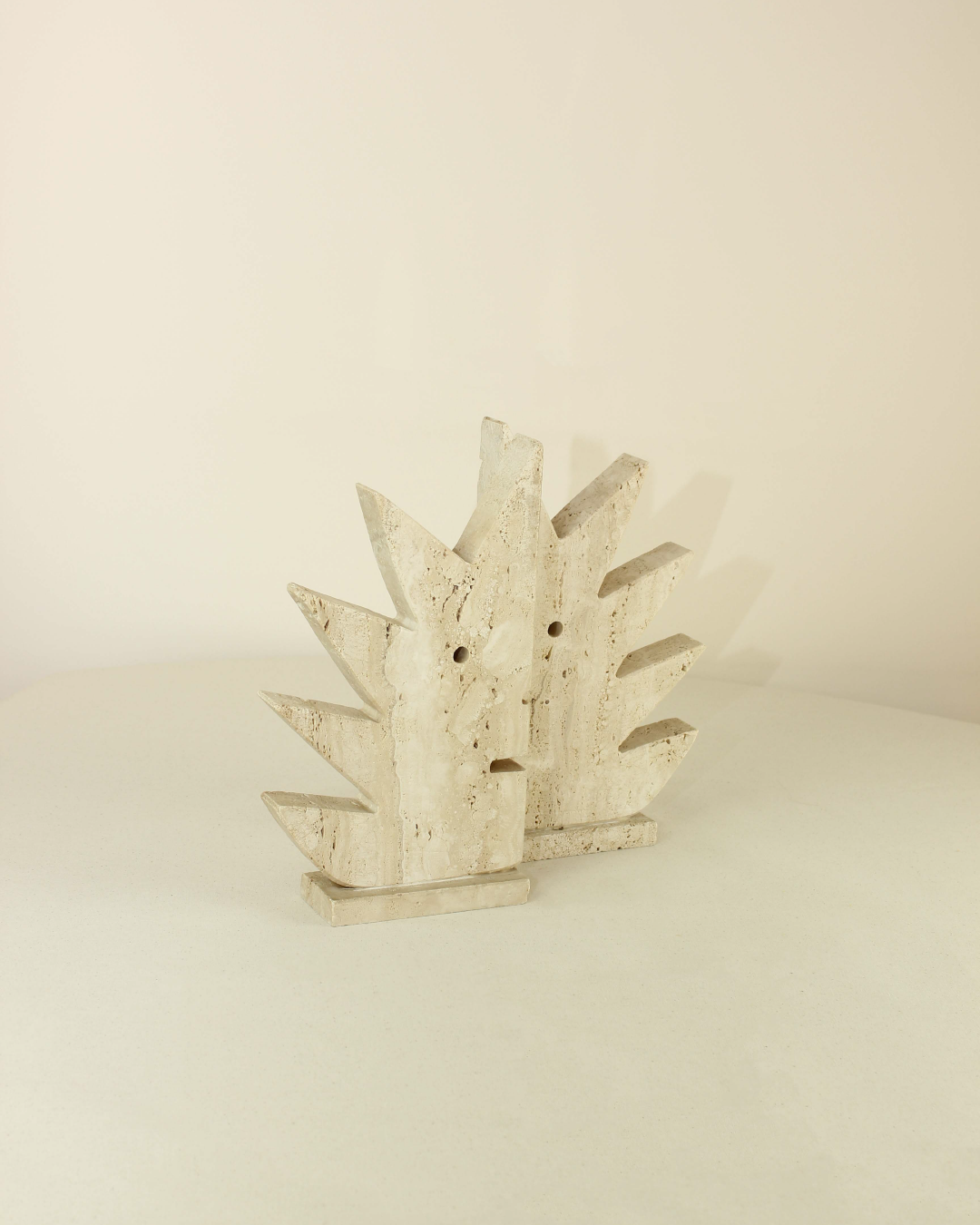 Sujeta libros Marmol Travertino