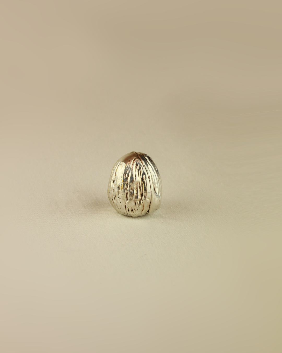 SCULPTURE 'NUEZ' EN ARGENT